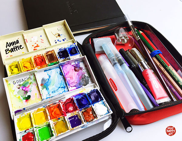 Contents of art travel kit on display